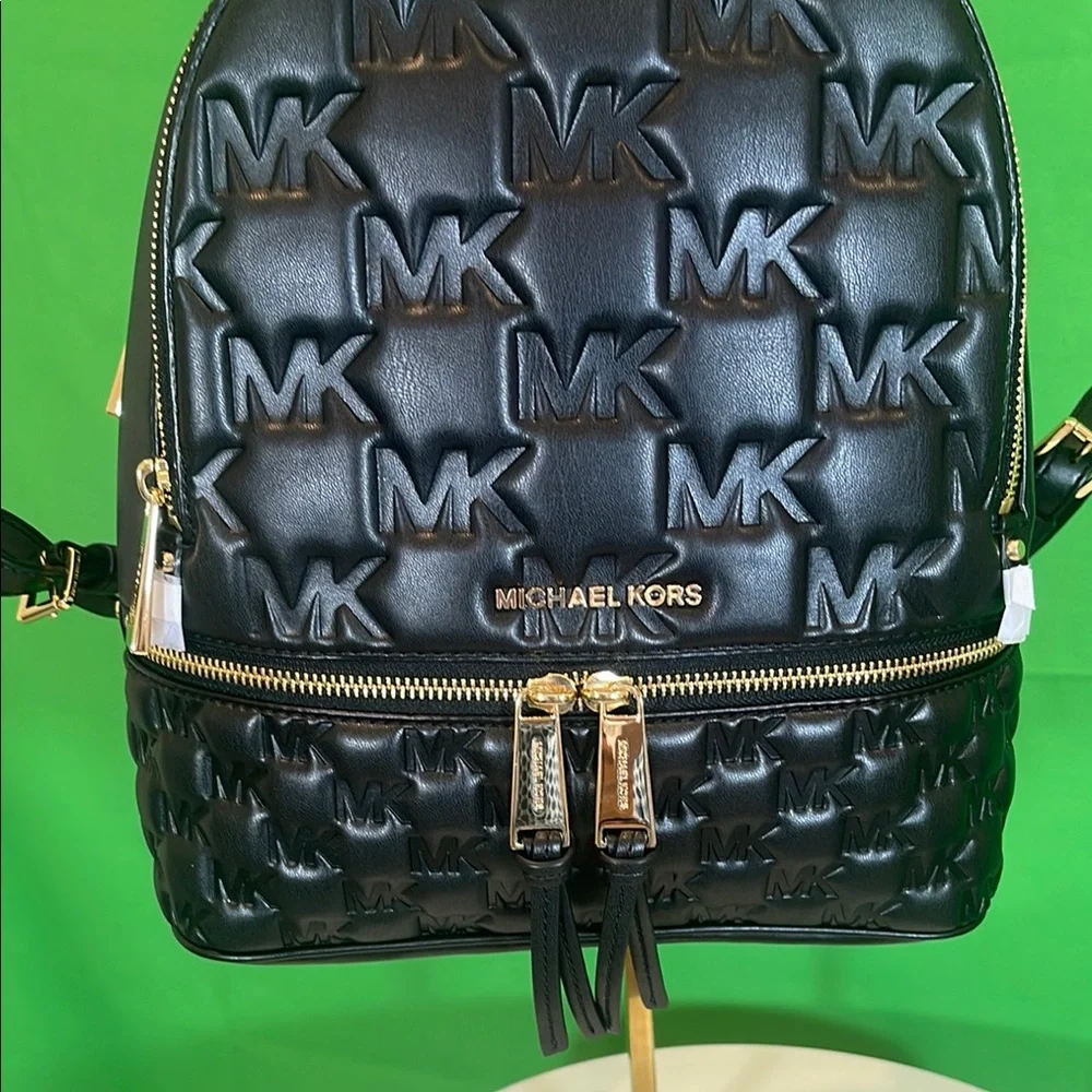 Michael Kors Embossed Black Backpack - Picture 3 of 9